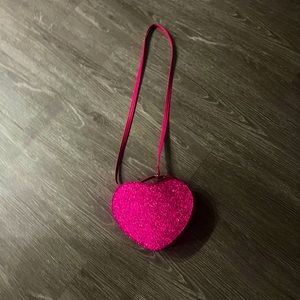 Pink, sparkly heart shaped purse